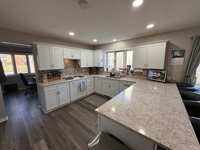 Nestled at the Country Club in Fort Dodge, this beautifully on Fort Dodge Country Club in Iowa - for sale on GolfHomes.com, golf home, golf lot