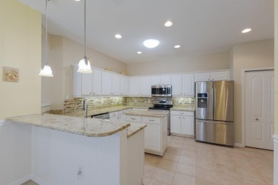 One or more photo(s) has been virtually staged. Pelican Pointe on Pelican Pointe Golf and Country Club in Florida - for sale on GolfHomes.com, golf home, golf lot