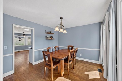 Nestled in the desirable Houndslake neighborhood, this inviting on Houndslake Country Club in South Carolina - for sale on GolfHomes.com, golf home, golf lot