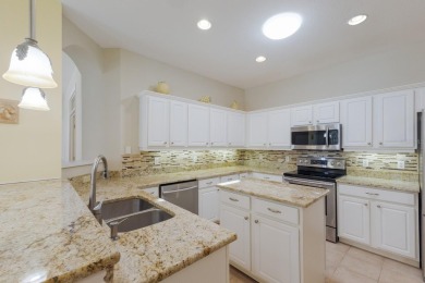 One or more photo(s) has been virtually staged. Pelican Pointe on Pelican Pointe Golf and Country Club in Florida - for sale on GolfHomes.com, golf home, golf lot