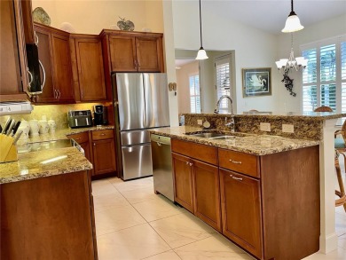 Stunning end unit, 3/2/2, 2013 built, split floor plan, 1471sf on Bobcat Trail Golf Club in Florida - for sale on GolfHomes.com, golf home, golf lot