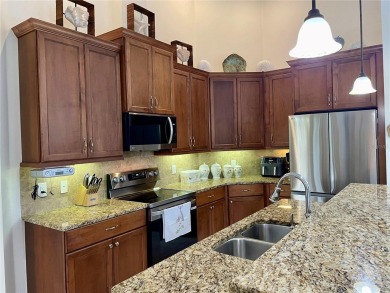 Stunning end unit, 3/2/2, 2013 built, split floor plan, 1471sf on Bobcat Trail Golf Club in Florida - for sale on GolfHomes.com, golf home, golf lot