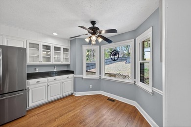 Nestled in the desirable Houndslake neighborhood, this inviting on Houndslake Country Club in South Carolina - for sale on GolfHomes.com, golf home, golf lot