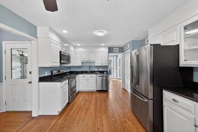 Nestled in the desirable Houndslake neighborhood, this inviting on Houndslake Country Club in South Carolina - for sale on GolfHomes.com, golf home, golf lot