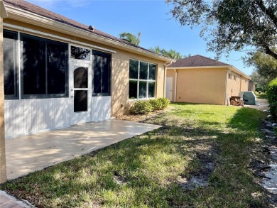 Stunning end unit, 3/2/2, 2013 built, split floor plan, 1471sf on Bobcat Trail Golf Club in Florida - for sale on GolfHomes.com, golf home, golf lot