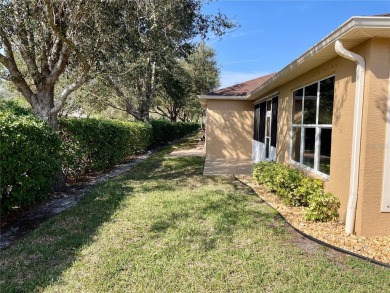Stunning end unit, 3/2/2, 2013 built, split floor plan, 1471sf on Bobcat Trail Golf Club in Florida - for sale on GolfHomes.com, golf home, golf lot