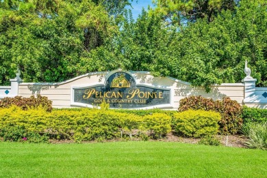 One or more photo(s) has been virtually staged. Pelican Pointe on Pelican Pointe Golf and Country Club in Florida - for sale on GolfHomes.com, golf home, golf lot