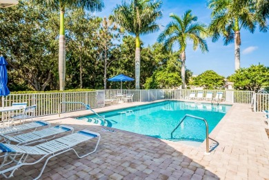 One or more photo(s) has been virtually staged. Pelican Pointe on Pelican Pointe Golf and Country Club in Florida - for sale on GolfHomes.com, golf home, golf lot