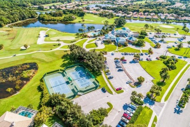 One or more photo(s) has been virtually staged. Pelican Pointe on Pelican Pointe Golf and Country Club in Florida - for sale on GolfHomes.com, golf home, golf lot
