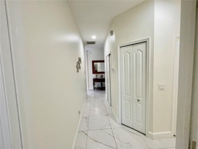 Stunning end unit, 3/2/2, 2013 built, split floor plan, 1471sf on Bobcat Trail Golf Club in Florida - for sale on GolfHomes.com, golf home, golf lot
