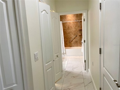 Stunning end unit, 3/2/2, 2013 built, split floor plan, 1471sf on Bobcat Trail Golf Club in Florida - for sale on GolfHomes.com, golf home, golf lot