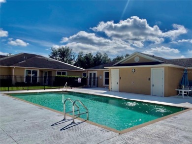 Stunning end unit, 3/2/2, 2013 built, split floor plan, 1471sf on Bobcat Trail Golf Club in Florida - for sale on GolfHomes.com, golf home, golf lot