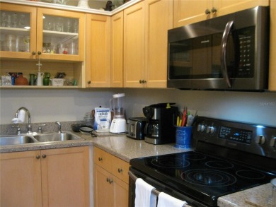IRONWOOD CONDOS. 55+ (I BLDG.). First floor End unit allows for on Pinebrook/Ironwood Golf Course in Florida - for sale on GolfHomes.com, golf home, golf lot