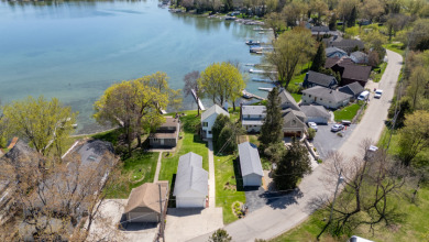 Dock your dreams on Big Cedar Lake! on West Bend Country Club in Wisconsin - for sale on GolfHomes.com, golf home, golf lot