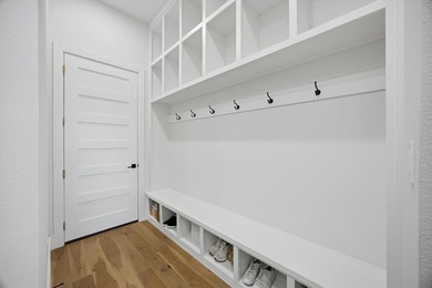 Looking for a modern custom built home recently built by an on Buffalo Creek Golf Club in Texas - for sale on GolfHomes.com, golf home, golf lot