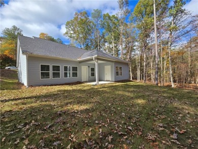 Discover the charm of modern living in Villa Rica with this on Fairfield Plantation Golf and Country Club in Georgia - for sale on GolfHomes.com, golf home, golf lot