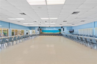 The Florida lifestyle awaits you! Vista Royale community offers on The American Golf Club in Florida - for sale on GolfHomes.com, golf home, golf lot