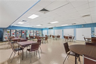 The Florida lifestyle awaits you! Vista Royale community offers on The American Golf Club in Florida - for sale on GolfHomes.com, golf home, golf lot