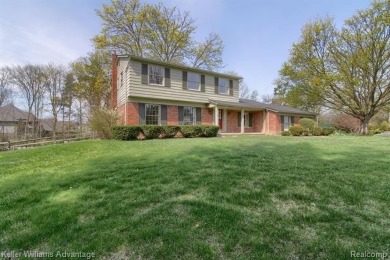 Welcome to this classic colonial in the highly regarded Glenview on Hilltop Golf Course in Michigan - for sale on GolfHomes.com, golf home, golf lot