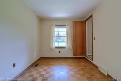 Welcome to this classic colonial in the highly regarded Glenview on Hilltop Golf Course in Michigan - for sale on GolfHomes.com, golf home, golf lot