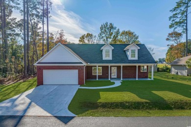 This brand-new, all-brick home in the desirable Long Bay Golf on Long Bay Club in South Carolina - for sale on GolfHomes.com, golf home, golf lot