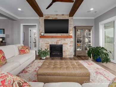 Discover refined lakeside living in this custom home completed on Mallard Head Country Club in North Carolina - for sale on GolfHomes.com, golf home, golf lot