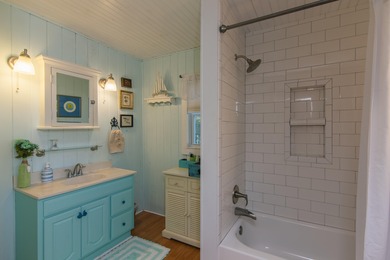 Charming and beautifully updated coastal cottage blending on The Plantation Course At Edisto in South Carolina - for sale on GolfHomes.com, golf home, golf lot