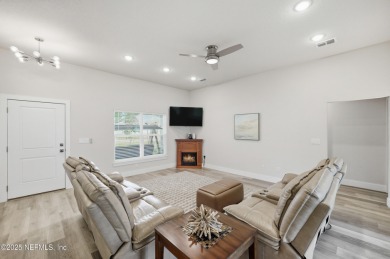 LIKE NEW! Welcome to this beautifully maintained 3-bedroom on The Grand Club Cypress Course in Florida - for sale on GolfHomes.com, golf home, golf lot