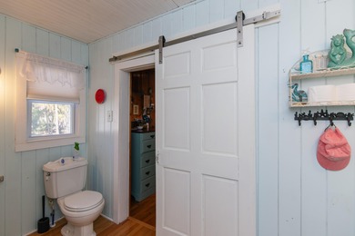 Charming and beautifully updated coastal cottage blending on The Plantation Course At Edisto in South Carolina - for sale on GolfHomes.com, golf home, golf lot