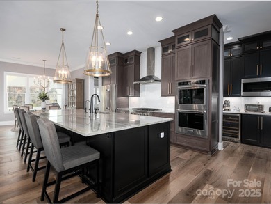 Discover refined lakeside living in this custom home completed on Mallard Head Country Club in North Carolina - for sale on GolfHomes.com, golf home, golf lot