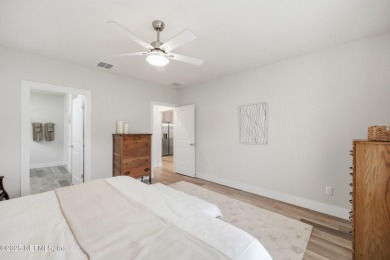 LIKE NEW! Welcome to this beautifully maintained 3-bedroom on The Grand Club Cypress Course in Florida - for sale on GolfHomes.com, golf home, golf lot