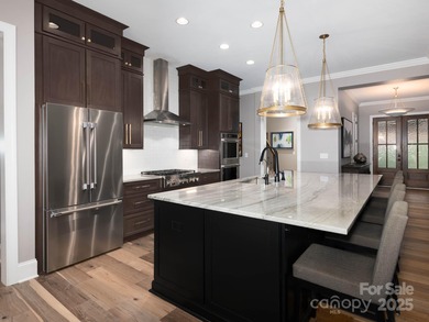 Discover refined lakeside living in this custom home completed on Mallard Head Country Club in North Carolina - for sale on GolfHomes.com, golf home, golf lot