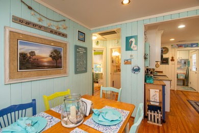 Charming and beautifully updated coastal cottage blending on The Plantation Course At Edisto in South Carolina - for sale on GolfHomes.com, golf home, golf lot