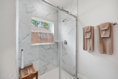 LIKE NEW! Welcome to this beautifully maintained 3-bedroom on The Grand Club Cypress Course in Florida - for sale on GolfHomes.com, golf home, golf lot