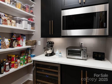 Discover refined lakeside living in this custom home completed on Mallard Head Country Club in North Carolina - for sale on GolfHomes.com, golf home, golf lot