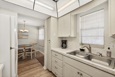 Come live where others vacation and Enjoy the ultimate coastal on Gulf Harbors Golf Course in Florida - for sale on GolfHomes.com, golf home, golf lot