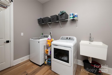 Discover refined lakeside living in this custom home completed on Mallard Head Country Club in North Carolina - for sale on GolfHomes.com, golf home, golf lot