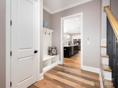 Discover refined lakeside living in this custom home completed on Mallard Head Country Club in North Carolina - for sale on GolfHomes.com, golf home, golf lot