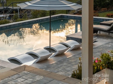 Discover refined lakeside living in this custom home completed on Mallard Head Country Club in North Carolina - for sale on GolfHomes.com, golf home, golf lot