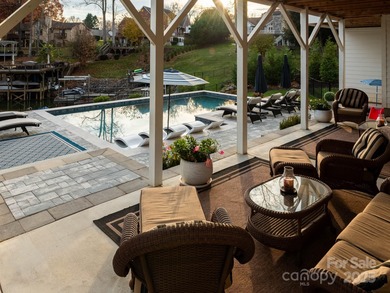 Discover refined lakeside living in this custom home completed on Mallard Head Country Club in North Carolina - for sale on GolfHomes.com, golf home, golf lot