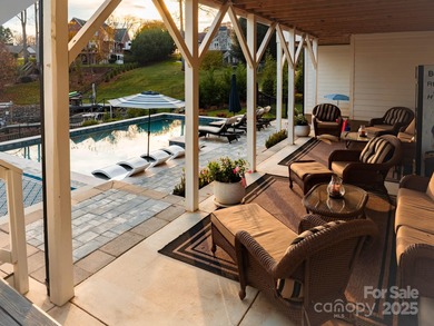 Discover refined lakeside living in this custom home completed on Mallard Head Country Club in North Carolina - for sale on GolfHomes.com, golf home, golf lot