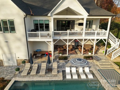 Discover refined lakeside living in this custom home completed on Mallard Head Country Club in North Carolina - for sale on GolfHomes.com, golf home, golf lot