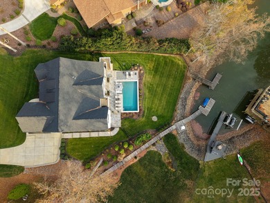 Discover refined lakeside living in this custom home completed on Mallard Head Country Club in North Carolina - for sale on GolfHomes.com, golf home, golf lot