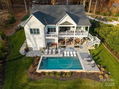 Discover refined lakeside living in this custom home completed on Mallard Head Country Club in North Carolina - for sale on GolfHomes.com, golf home, golf lot