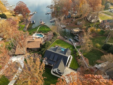 Discover refined lakeside living in this custom home completed on Mallard Head Country Club in North Carolina - for sale on GolfHomes.com, golf home, golf lot