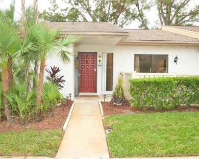 WELCOME TO EAST LAKE WOODLANDS. THIS VILLA IS LOCATED IN ONE OF on East Lake Woodlands Country Club in Florida - for sale on GolfHomes.com, golf home, golf lot