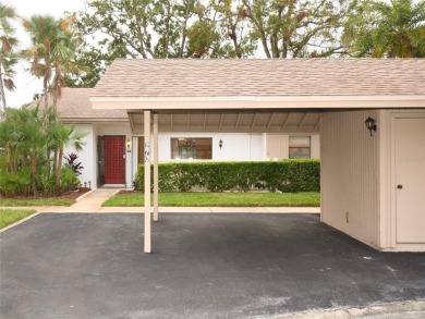 WELCOME TO EAST LAKE WOODLANDS. THIS VILLA IS LOCATED IN ONE OF on East Lake Woodlands Country Club in Florida - for sale on GolfHomes.com, golf home, golf lot