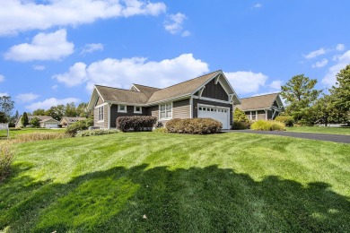 Gorgeous, custom-quality condo on a beautiful pond in popular on Watermark Country Club in Michigan - for sale on GolfHomes.com, golf home, golf lot