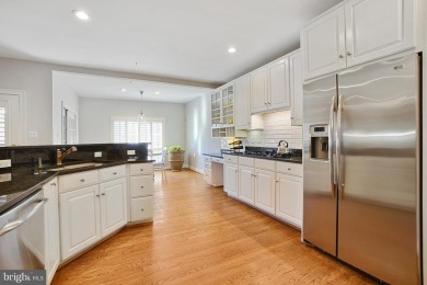 Welcome home! This luxurious Natelli-built  townhome in the on TPC Potomac At Avenel in Maryland - for sale on GolfHomes.com, golf home, golf lot