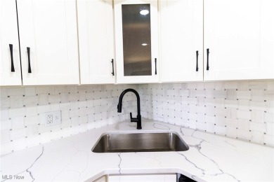 Highly desirable North Hudson condominium overlooking the 10th on The Country Club of Hudson in Ohio - for sale on GolfHomes.com, golf home, golf lot